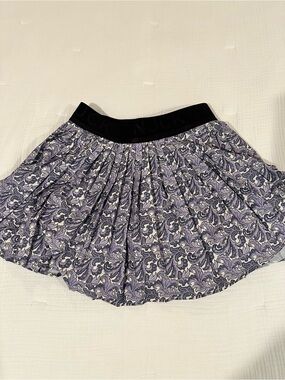 Tuckernuck Pleated Athleisure Floral Print Mini Skirt in Lavender